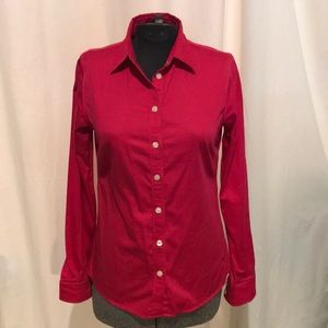 Fuchsia pink long sleeved button down shirt.